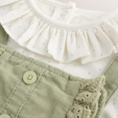 sage green embroidered long sleeve bodysuit and cord dungaree 2 piece