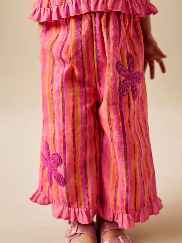 pink/ orange stripe / crochet flowers top & trousers set (3mths 7yrs) pink/ orange stripe / crochet flowers top & trousers set (3mths 7yrs)