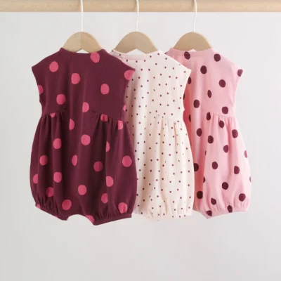 pink polka dot button through baby rompers 3 pack