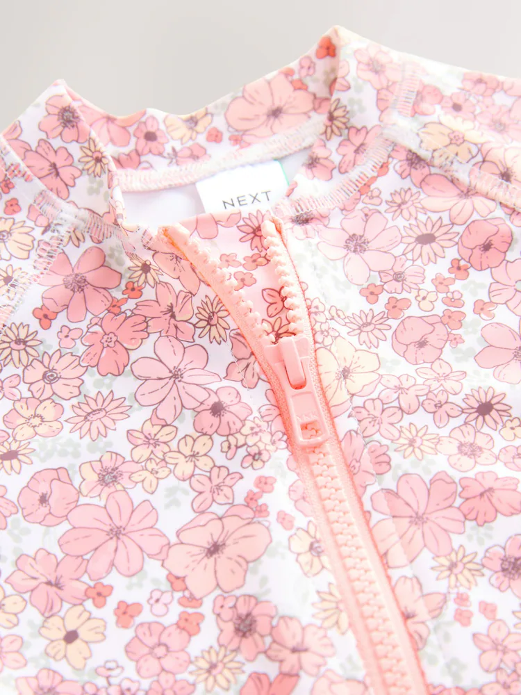 coral pink ditsy floral long leg sunsafe swimsuit (3mths 7yrs) coral pink ditsy floral long leg sunsafe swimsuit (3mths 7yrs)