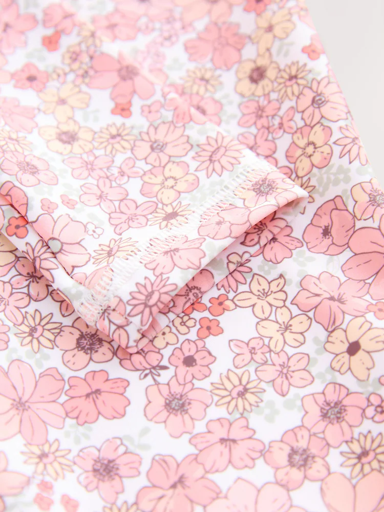 coral pink ditsy floral long leg sunsafe swimsuit (3mths 7yrs) coral pink ditsy floral long leg sunsafe swimsuit (3mths 7yrs)